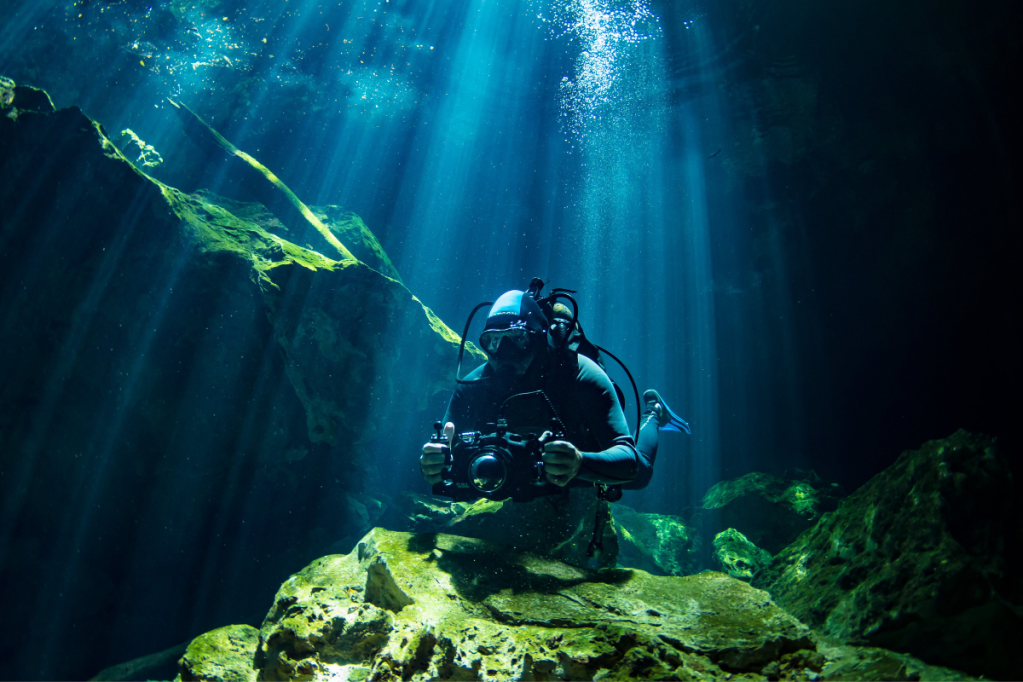 Diver with camera underwater