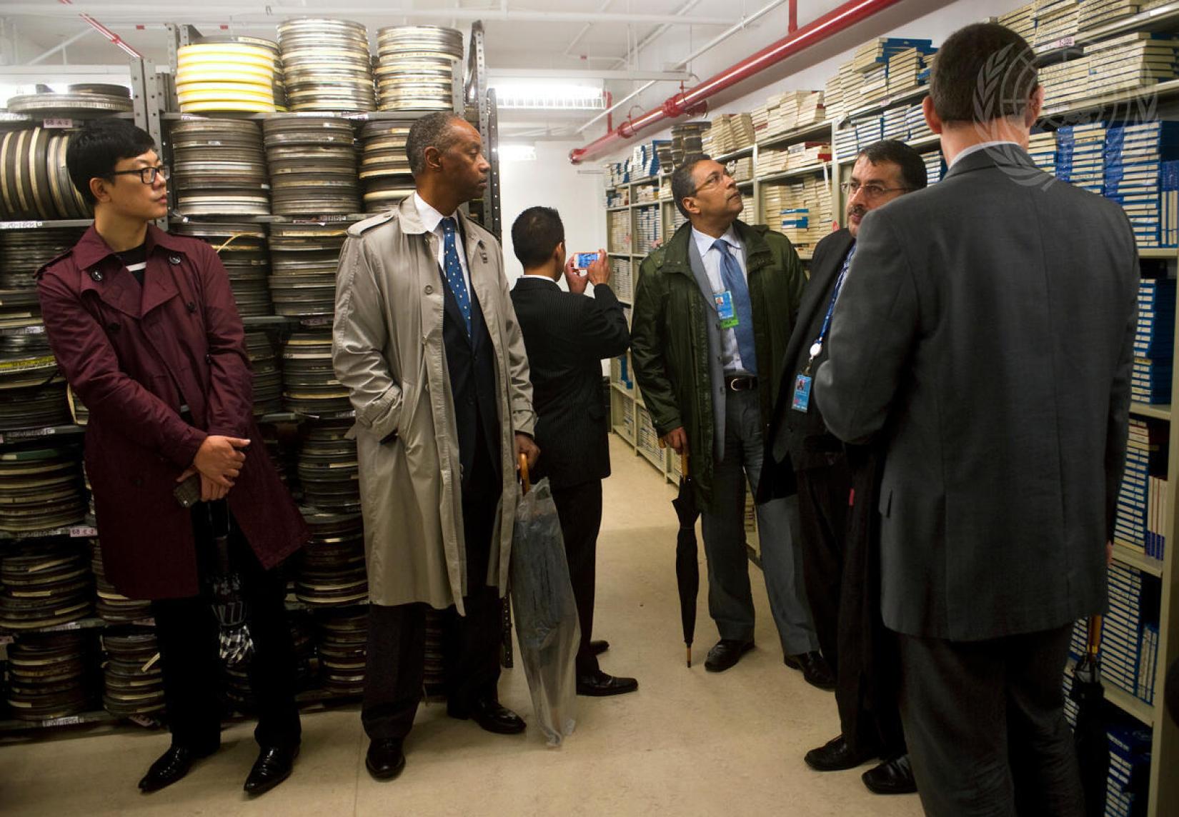 UN staff members and delegates on a tour of the Department of Public Information (DPI) audiovisual archives at UN Headquarters.