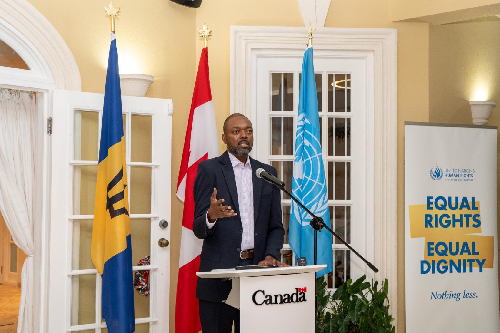 Minister of Labour, Social Partnership Relations and the Third Sector, the Hon. Colin E. Jordan, M.P, delivers address form podium