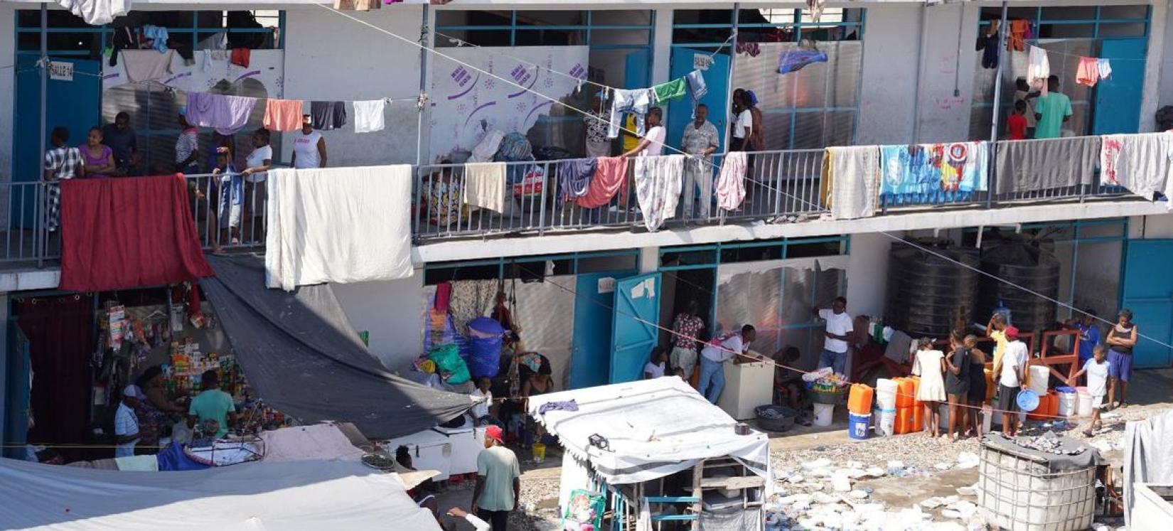 Some people who have fled their homes in Haiti are now living in schools.