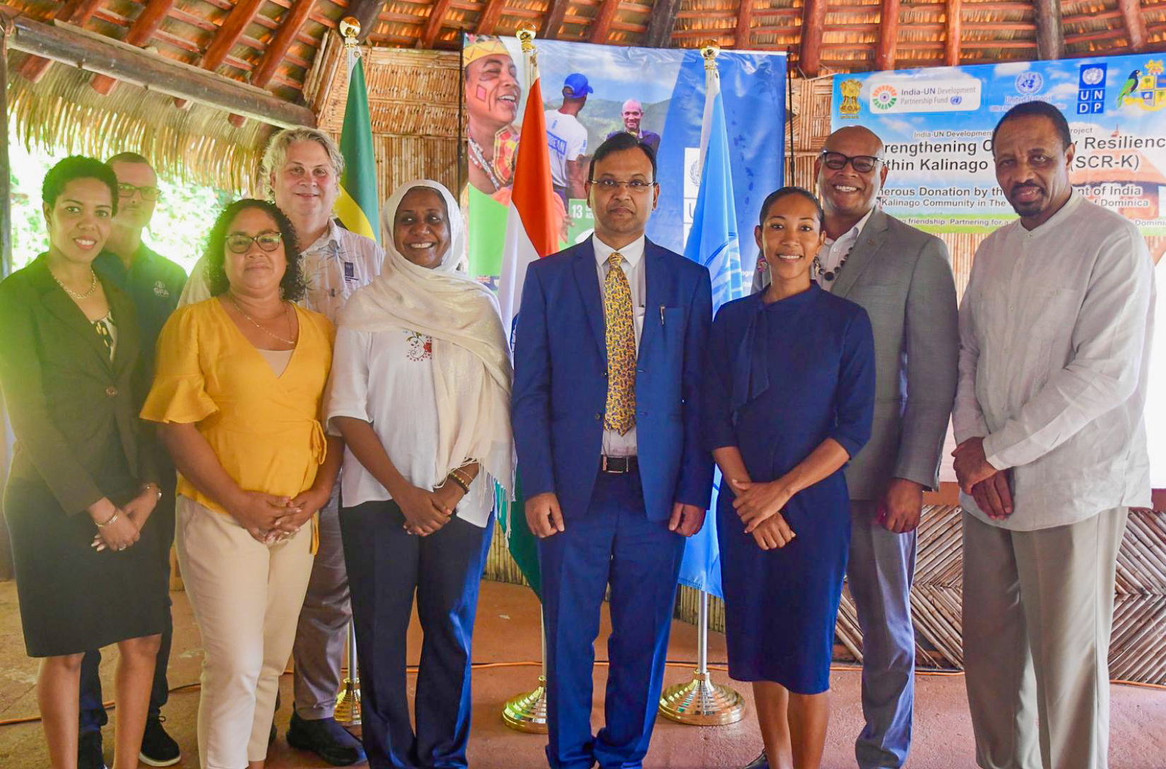 Officials from Dominica's Ministry of Environment, Rural Modernisation, and Kalinago Upliftment and Constituency Empowerment, the Kalinago Council, the High Commission of India to the Commonwealth of Dominica, and UNDP Barbados and the Eastern Caribbean Multi-Country Office at the media launch of the Strengthening Community Resilience within the Kalinago Territory (SCR-K) project at the Barana Autê on December 19, 2024.