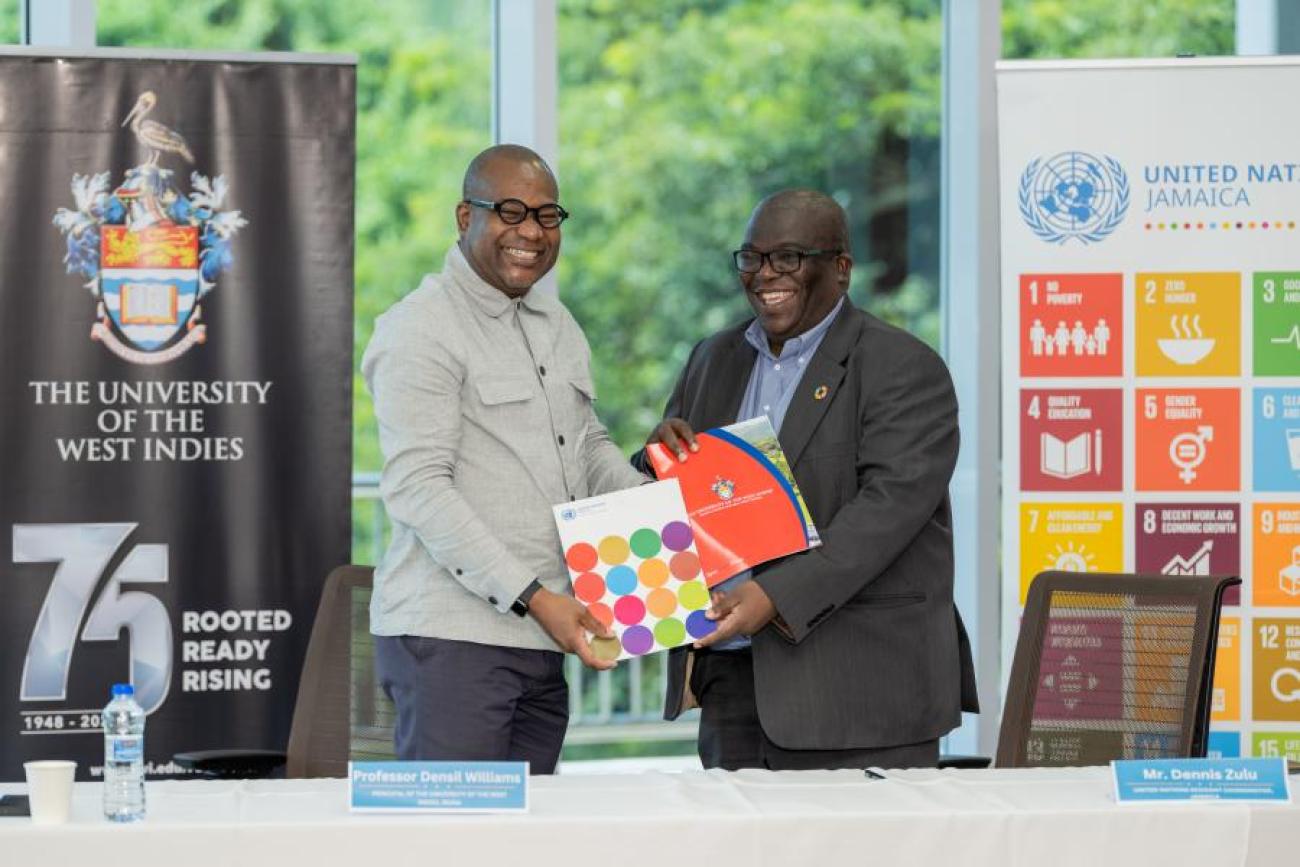 UN Inks New Partnership with the University of the West Indies. Agreement signed by Professor Densil A. Williams, Principal, UWI Mona (L) and Mr. Dennis Zulu UN Resident Coordinator (R)