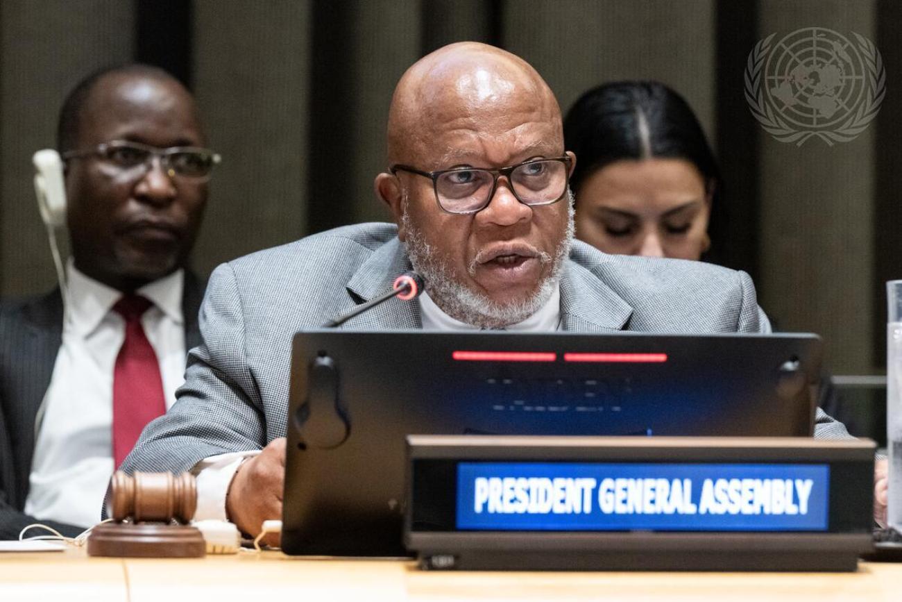 Dennis Francis, President of the seventy-eighth session of the General Assembly, speaks into microphone.