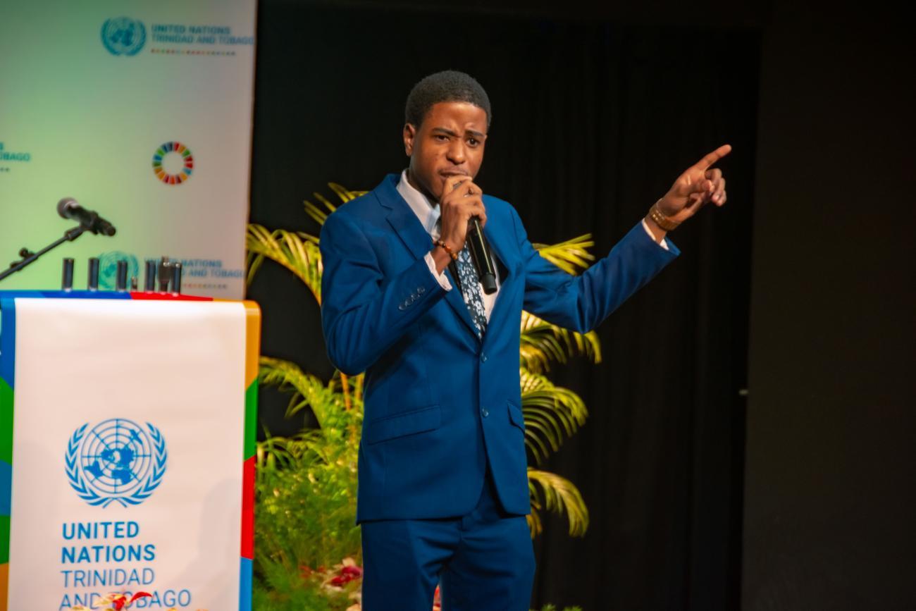 Mark Howell-Paul, a composer, producer, musician and extempo singer, delivers one of his verses on the Sustainable Development Goals during the UN Day 2024 Partners and Staff Event