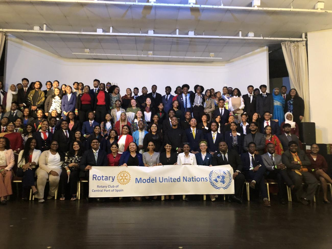 Delegates celebrate the completion of their debate on gender and climate at the end of the 24th annual Model UN, hosted by the Rotary Club of Central Port of Spain.