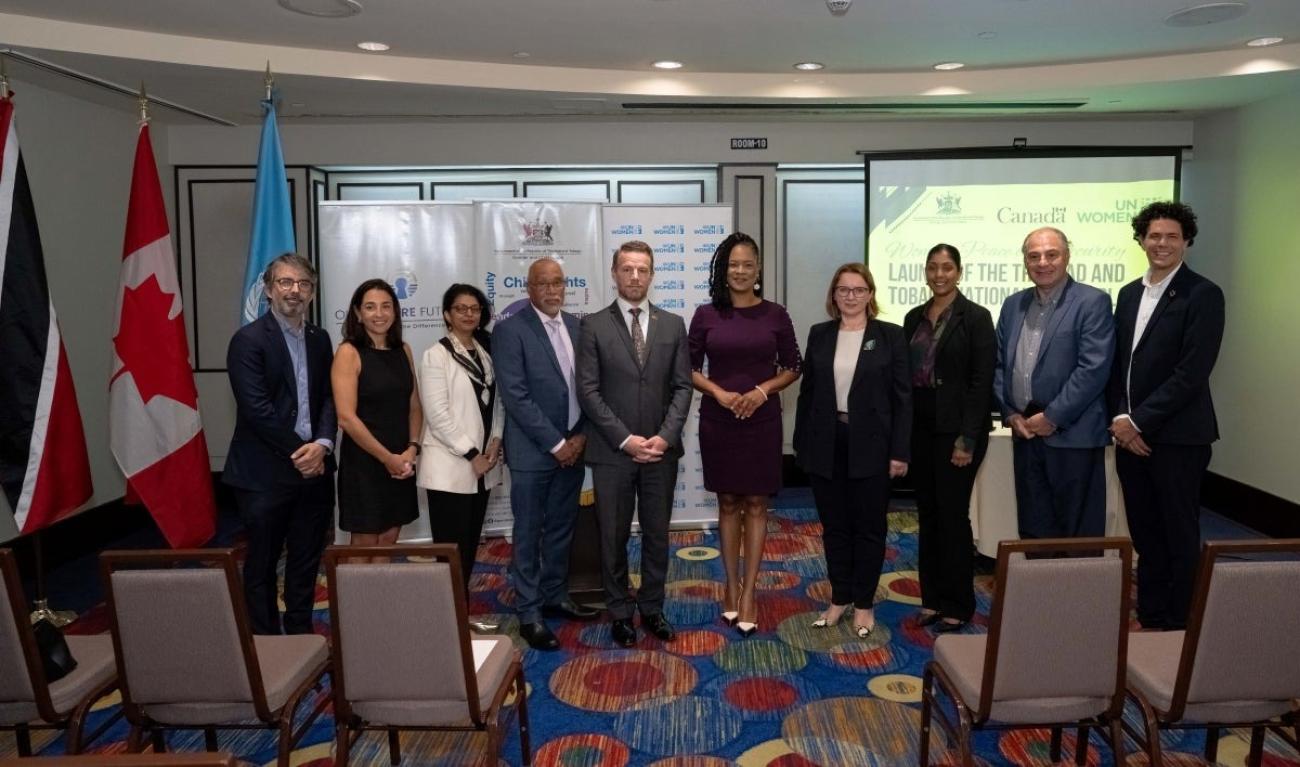 Celebrating at the Launch of the Women, Peace and Security National Action Plan of Trinidad and Tobago at the Hilton Trinidad and Conference Centre on Wednesday 26th March, 2025 were (centre) the Honourable Ayanna Webster-Roy, Minister in the Office of the Prime Minister with responsibility for Central Administrative Services Tobago, Gender and Child Affairs, and the National AIDS Coordinating Committee; (L-R) Mr. Stuart Shaw, Counsellor, High Commission of Canada; Delfina Garcia Hamilton, UN Women Represen