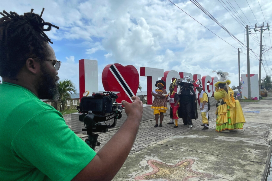 Purpose videographer films Verified Initiative Carnival performers in Tobago