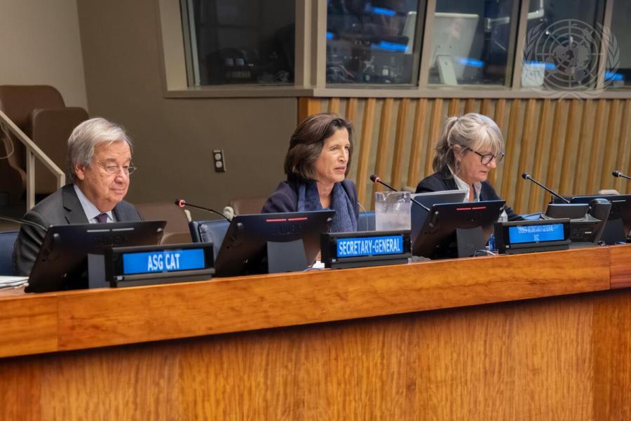 Melissa Fleming (centre), Under-Secretary-General for Global Communications, speaks during the United Nations Climate Ambition Summit 2023. At left is Secretary-General António Guterres.