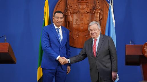 Secretary-General António Guterres (right) and Prime Minister Andrew Holness of Jamaica shake hands prior to their press conference in Kingston, Jamaica.