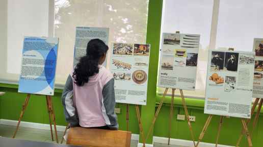 A student in Trinidad and Tobago views the UNIC Caribbean Exhibit on the history of slavery in the Caribbean.